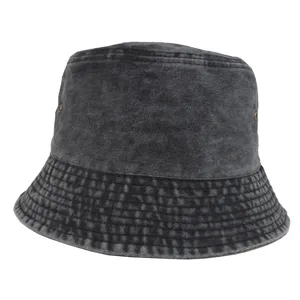 Close-up of washed denim bucket hat texture and stitching detail