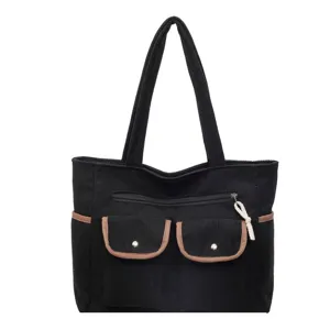 Large black corduroy tote bag with brown trim and front pockets for women daily commute