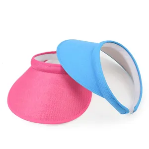 Detailed macro view showing the texture of pink and blue summer sun visor hats