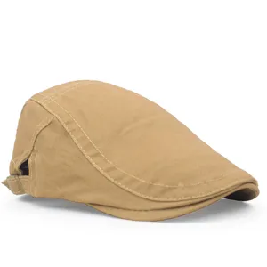 Detailed view of the khaki cotton flat cap with high-quality stitching and retro style.