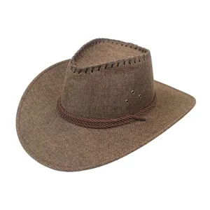Close-up of brown woven cowboy hat with braided rope trim and ventilation eyelets.