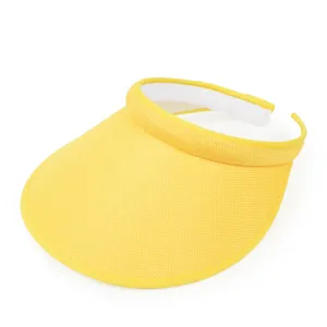 Macro view of a yellow woven sun visor hat showing material texture and comfort band
