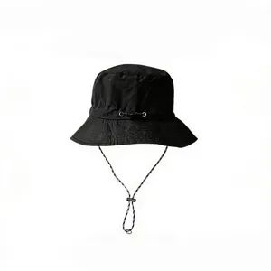 Detailed view of black quick-dry waterproof bucket hat with chin strap and drawstring