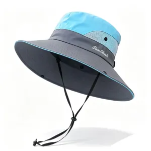 Professional detail shot of a breathable outdoor sun hat with wide brim and mesh panels.