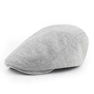 Classic light grey knitted flat cap featuring a soft marl texture and vintage newsboy style
