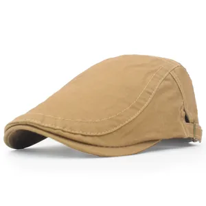 Detailed side view of a vintage khaki cotton flat cap with an adjustable metal buckle.