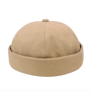 Frontansicht einer khaki Docker-Mütze mit Details zu Baumwolltextur und sauberen Nähten