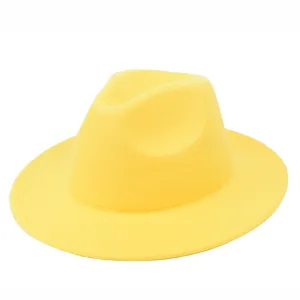 Detailed side view of a vibrant yellow solid color felt fedora hat for men and women.