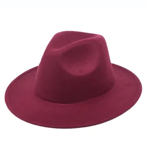 Detailed view of the maroon felt fedora hat with a classic wide flat brim style