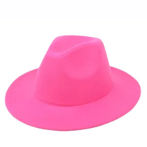 Detailed view of the vibrant rose pink felt fedora hat with a wide flat brim