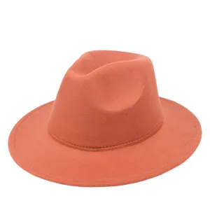 Elegant burnt orange wool felt fedora hat with a flat wide brim for autumn and winter