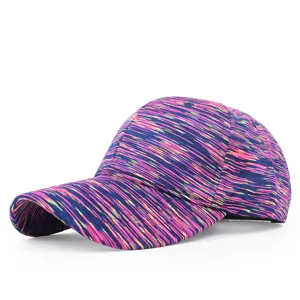 Close-up detail showing vibrant pink and blue tie-dye pattern on athletic baseball cap.