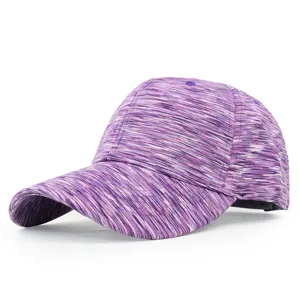 Detailed view of a purple tie-dye patterned sports baseball cap with a curved brim.