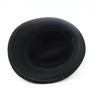 Detailed top view of a black wool felt fedora hat showing inner sweatband and wool texture