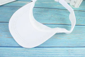 Macro detail view showing the inner sweatband and premium stitching of the white sun visor