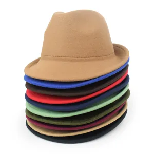 Detailed stack of colorful wool felt fedora hats for men in various winter shades