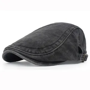 Macro view of vintage washed cotton flat cap with adjustable metal buckle detail