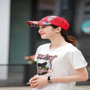 Detailed view of red floral mesh baseball cap for women with breathable design