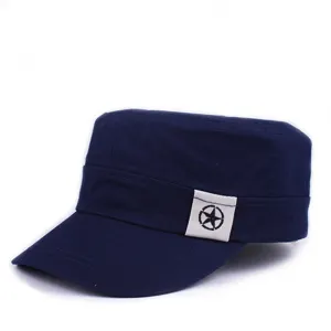 Side profile detail of navy blue flat-top cap showcasing the stitched star logo patch texture