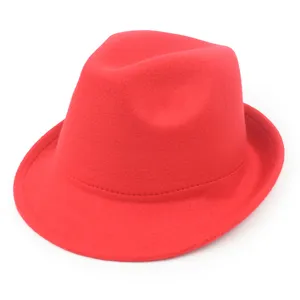 Detailed view of a classic red wool fedora hat for men, showcasing soft fabric texture