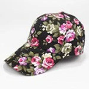Women's floral baseball cap with pink rose pattern on black background
