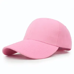Close-up detail of a classic pink plain baseball cap with a sturdy curved brim design