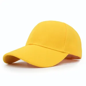Side view of a vibrant yellow plain baseball cap showing textured twill fabric detail