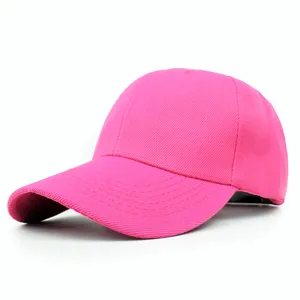 Macro view of bright pink cotton twill baseball cap with classic curved brim design
