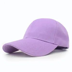 Macro view of solid purple baseball cap showing fine twill fabric texture and curved brim