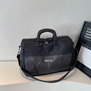 Large capacity black travel duffle bag for sports and fitness with a front mesh pocket