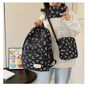 Detailed shot of the 3-piece backpack set featuring trendy white bow patterns on model