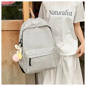 Zaino a quadretti stile Mori per ragazza, perfetto per scuola e viaggi quotidiani.