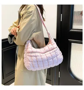 Pink puffy cloud bag for women, quilted puffer design, minimalist shoulder bag.