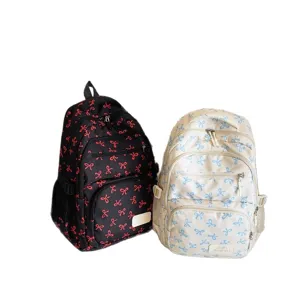 Large capacity fashion student backpack featuring cute bow print and multiple zipper pockets