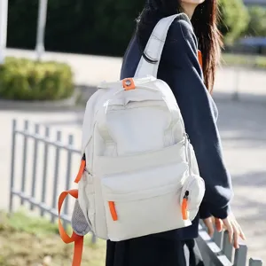 Sac à dos blanc imperméable de grande capacité avec accents orange pour l'école et voyage