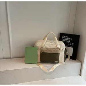 Versatile cream and olive green sports gym bag with tablet for size reference in a clean setting