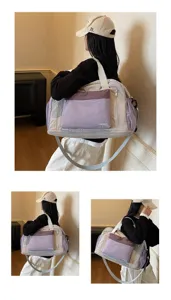 Spacious dry-wet separation sports gym bag in purple and grey worn by a model