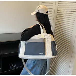 Asian model carrying a large white dry-wet separation travel bag for gym and fitness