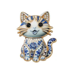 Charming cartoon cat brooch with blue and white porcelain enamel finish for women