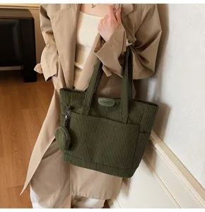 Dark green corduroy tote bag with large capacity and detachable round pouch detail