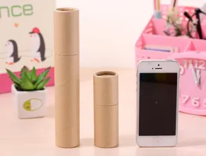 Comparison of two sizes of kraft paper pencil tubes with a smartphone for scale