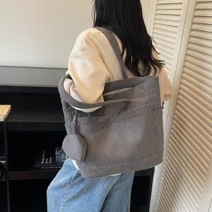 Stylish gray corduroy large capacity tote bag with matching coin pouch for women
