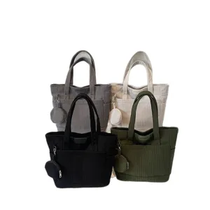 Set of four corduroy tote bags in black, gray, beige, and olive green for daily use