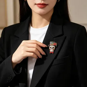 Vintage Day of the Dead sugar skull brooch with top hat and flowers on black blazer