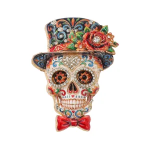 Vibrant Mexican Day of the Dead skull brooch with floral top hat and red bow tie