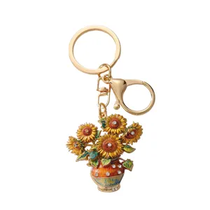 Llavero creativo de girasol de Van Gogh con colgante de esmalte para decorar mochilas