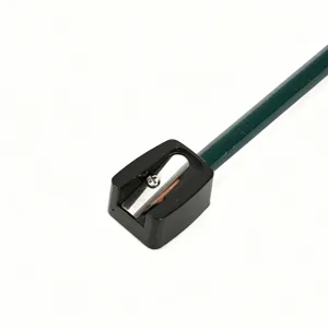 Close-up macro view of mini single-hole pencil sharpener for makeup and sketching