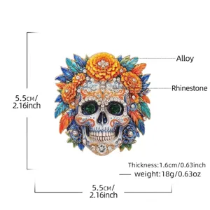 Colorful Day of the Dead skull brooch with floral details and sparkling rhinestones