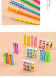 Assorted colorful plastic pencil caps and cartoon bear extenders for school stationery