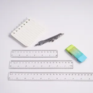 Transparent plastic rulers set with compass eraser and notebook for student drawing stationery.
